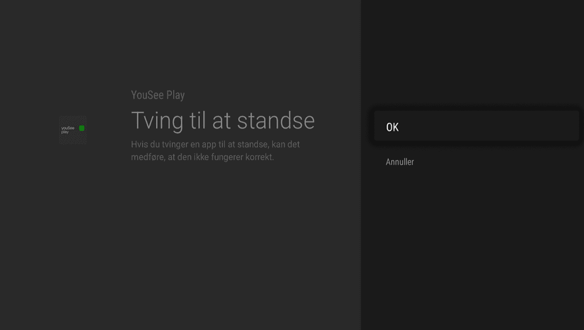 Mørkt vindue med stor hvid tekst til venstre Tving til at standse. Til højre er mørk menu åbnet med knappen OK fremhævet og Annuller under.