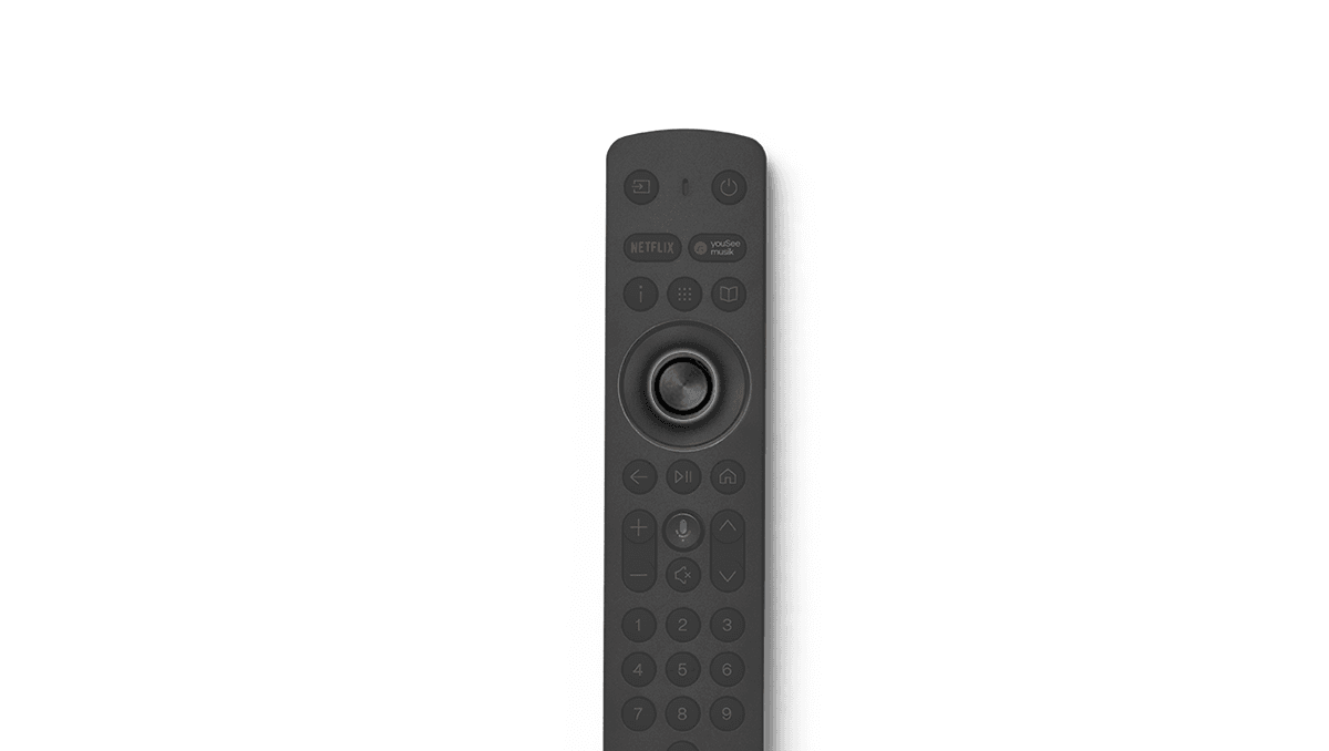 Sort YouSee Audio-fjernbetjening med OK-knappen i midten fremhævet og valgt.