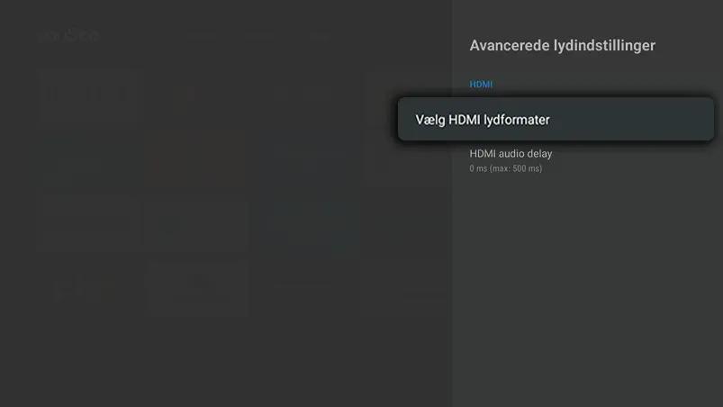 Mørk indstillingsmenu med Avancerede lydindstillinger, hvor Vælg HDMI‑lydformater er markeret i højre side.